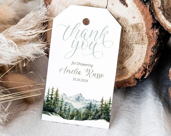 May include: White thank you tag with a watercolor illustration of a mountain range and forest. The text reads "Thank You for Showering Amelia Russo 10.24.2024".