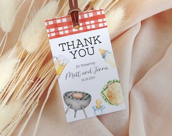 May include: A baby shower thank you tag with a red and white checkered top. The tag has the words "Thank You" and "for Showering Matt and Jenna 10.24.2024". The tag has illustrations of a beer, baby bottle, grill, and a sandwich.