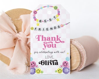May include: Pink and white thank you tag with a colorful beaded necklace that says "Best Friends". The tag also says "Thank you for celebrating with me! Love, Olivia" with a smiley face design.