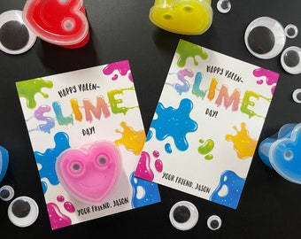May include: Two printable Valentine's Day cards with the text "Happy Valen-Slime Day!" and googly eyes. The cards are decorated with colorful slime splatters. The text "Your Friend. Jason" is at the bottom of each card.