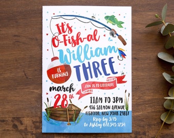 May include: A printable birthday invitation for a boy's third birthday party. The invitation features a cartoon fishing rod, a red and white fishing bobber, a blue and white boat, and the text "It's O-Fish-al William is turning Three". The invitation also includes the date "March 28th", the time "11am to 3pm", the address "156 Salmon Avenue, Fishhook, New York 29817", and the RSVP information "RSVP by 3/15 to Ashley 678.345.1234".
