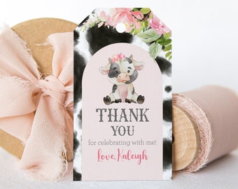 May include: Pink and black cow-themed thank you tag with a watercolor illustration of a cow with a pink flower crown. The tag says "Thank You for celebrating with me! Love, Kaleigh".
