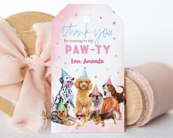 May include: Pink and white thank you tag with a paw print design and the text "Thank you for coming to my Paw-ty. Love, Amanda". The tag features a group of dogs wearing party hats.