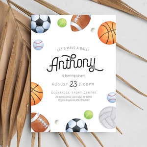 May include: A white invitation with a watercolor illustration of various sports balls, including a basketball, football, baseball, soccer ball, volleyball, and tennis ball. The text on the invitation reads "Let's Have a Ball! Anthony is turning seven August 23 2:00PM Glenridge Sport Centre 29 Batting Drive, Glenridge, AL 98765 Rsvp to Angela at 456.789.4567"