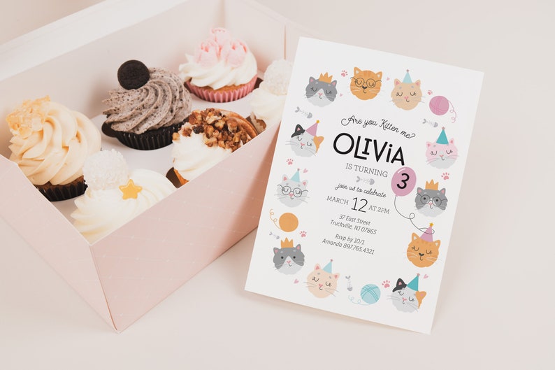May include: A pink and white birthday invitation with a cat theme. The invitation says "Are you kitten me? Olivia is turning 3. Join us to celebrate March 12 at 2 PM. 37 East Street, Truckville, NJ 07865. RSVP by 10/1. Amanda 897-765-4321."