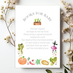 May include: A white card with green watercolor illustrations of plants and vegetables. The text on the card reads "BOOKS FOR BABY" and includes a request to bring a signed storybook instead of a card.
