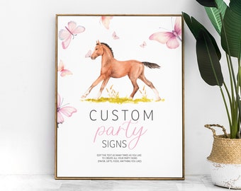 May include: Printable sign featuring a watercolour illustration of a brown foal and pink butterflies. The text reads "CUSTOM party SIGNS EDIT THE TEXT AS MANY TIMES AS YOU LIKE TO CREATE ALL YOUR PARTY SIGNS (FAVOR, GIFTS, FOOD, ANYTHING YOU LIKE)"