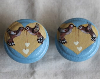 blue handles, blue decor, blue brown knob, bird pull, bird handle, brown bird, painted bird knob, cream heart knob, painted heart