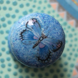 bright blue knob, butterfly blue knob, speckled paint and butterfly design, cabinet furniture, drawer pulls, unique knobs and dresser knobs.