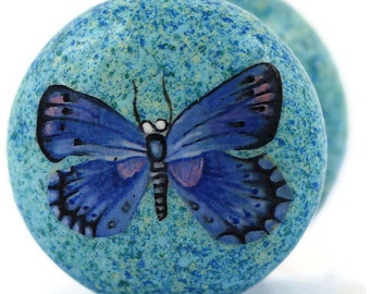 turquoise speckle dresser knob with blue butterfly design. handpainted. transform your furniture.