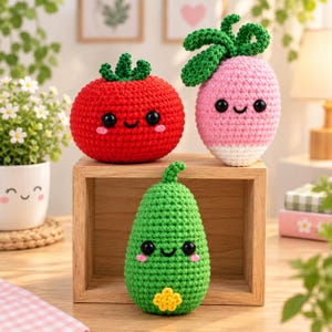 May include: Three crocheted plush toys shaped like vegetables. A round red tomato, a pink radish with green leaves, and a green pear-shaped vegetable with a small yellow flower. Each toy features black safety eyes and a stitched smiling mouth.