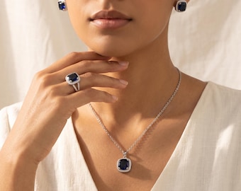 Sieradenset met halo van koningsblauwe zirkonia, halsketting, oorbellen en ring met kussenslijpsel (zilverkleurig)