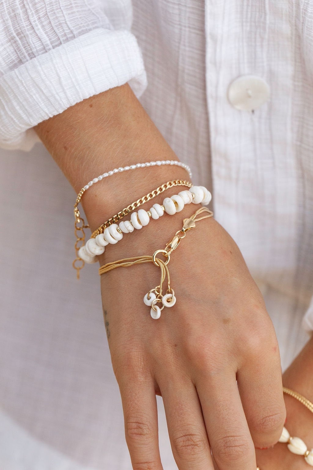Gold puka cheap shell bracelet