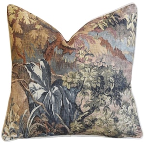 May include: A decorative throw pillow with a tapestry-like design featuring a forest scene with trees, leaves, and branches in shades of brown, green, blue, and pink.