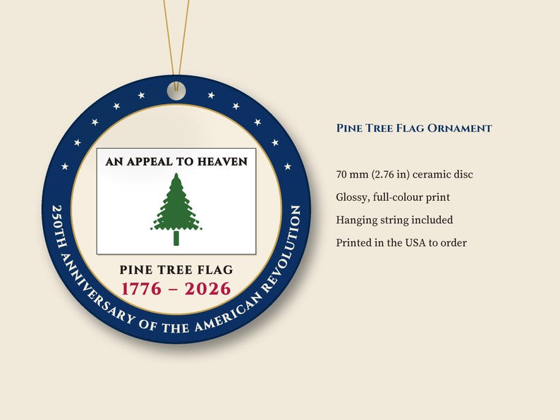 May include: A round ceramic ornament measuring 70 mm (2.76 in) in diameter. The blue border features white stars and the text 250TH ANNIVERSARY OF THE AMERICAN REVOLUTION. The center displays the Pine Tree Flag with AN APPEAL TO HEAVEN.