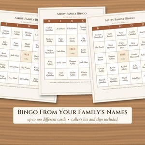 May include: Three white bingo cards titled Ashby Family Bingo with brown headers and a central free space. Each card features a grid of names. Below the cards, a rectangular label reads Bingo From Your Family's Names, up to 100 different cards, caller's list and slips included.