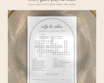 May include: A white rectangular wedding game card with a black arched border, featuring the title Sip & Solve, a crossword puzzle, and clues. The text includes How well do you know Emma & James?, Across, Down, Good Luck!, Your Name, and Table.