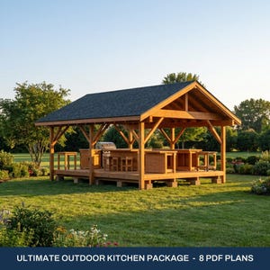 May include: A wooden outdoor kitchen structure with a dark shingled gable roof, featuring a built-in grill, counter space, and stools on a raised platform. The text at the bottom reads: ULTIMATE OUTDOOR KITCHEN PACKAGE - 8 PDF PLANS.