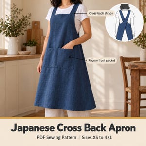 May include: A dark blue apron featuring cross back straps and a roomy front pocket. The text on the image reads: Japanese Cross Back Apron, PDF Sewing Pattern, Sizes XS to 4XL. The design includes a square neckline and a full skirt.