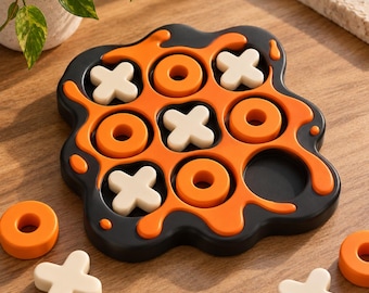 Juego de tres en raya abstracto impreso en 3D con diseño de flujo de lava, decoración de escritorio con estética de arte fluido.