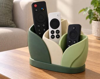Soporte para mando a distancia con diseño de hoja lisa, impreso en 3D, organizador moderno y orgánico para sala de estar.