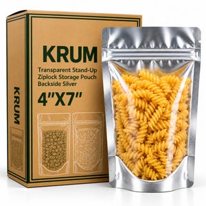 May include: A tan cardboard box labelled KRUM Transparent Stand-Up Ziplock Storage Pouch Backside Silver 4"x7" next to a silver and clear plastic pouch filled with yellow spiral pasta. The box features line drawings of pouches with contents.