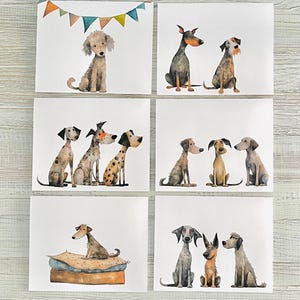 May include: Six cards with watercolor illustrations of dogs. Each card features a different breed of dog in various poses. The cards are white with a white border.