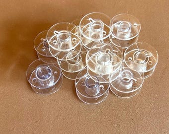Clear Empty Plastic Bobbin Spools - Class 15 - 12 count