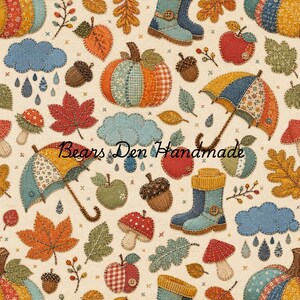 Könnte beinhalten: Ein Stoffmuster mit einem sich wiederholenden Herbstthema mit Kürbissen, Äpfeln, Eicheln, Pilzen, Regenwolken, Regenschirmen und Stiefeln. Das Design enthält genähte Details und den Text Bears Den Handmade in der Mitte.