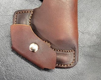 Pocket holster for Cobra bearman 38 with ammo pouch.