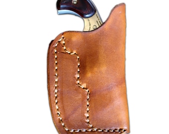 Pocket holster for North American Arms 22 LR with 1 5/8 barrel.  Leather Tan
