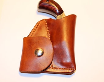 Pocket holster with ammo pouch for NAA 22 Mag Sidewinder