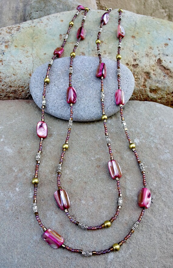 Items similar to Long summer necklace with pink shells on Etsy