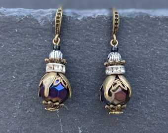 A unique pair of handmade brass, silver & petrol blue / black steam punk clockwork bead bee / beetle / insect earrings.