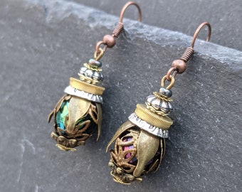 A unique pair of handmade brass, silver & petrol purple steam punk clockwork bead bee / beetle / insect earrings.