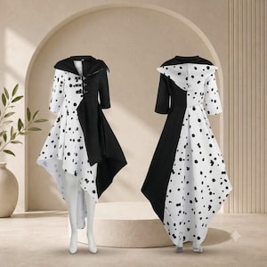 May include: A hooded high-low dress featuring a split design with solid black on one side and white with black polka dots on the other. The front includes three horizontal buckle straps across the chest, while the back displays a hood.