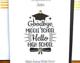 May include: A graduation card with the text "Congratulations Jaden" at the top. The card says "Goodbye Middle School Hello High School" with a graduation cap and diploma graphic. The school name, location, and year are also printed.