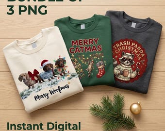 May include: A bundle of three crewneck sweatshirts featuring holiday graphics. One cream sweatshirt shows three dachshunds with the text Merry Woofmas. One dark green sweatshirt shows cats with Merry Catmas. One charcoal sweatshirt shows a raccoon with Trash Panda Christmas.