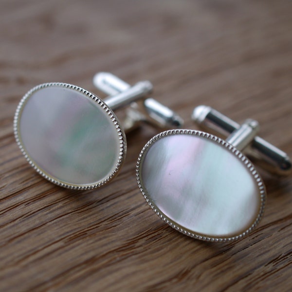 Gemelos de nácar, chapados en plata, regalo de aniversario