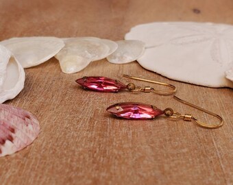 Vintage Swarovski crystal earrings.  Bright Pink Navette stones and brass Earrings.