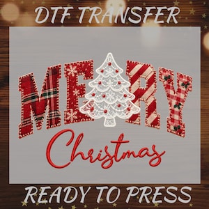 May include: A DTF transfer design featuring the text MERRY with a white lace Christmas tree replacing the letter E. The letters feature red plaid, snowflake, and candy cane patterns. The word Christmas is written below in red cursive script.