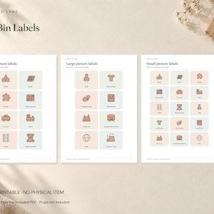 May include: Three sheets of printable toy bin labels featuring icons for items like blocks, books, puzzles, and board games. Each label has a soft-colored background in peach or light blue with black line art illustrations and text labels.