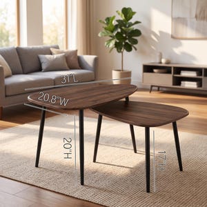 May include: A set of two nesting coffee tables with dark brown wood-grain tops and black metal legs. The larger table measures 31 inches long, 20.8 inches wide, and 20 inches high. The smaller table stands at 17 inches high.