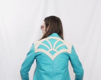 OZEN custom handmade one of a kind turquoise and cream leather jacket.