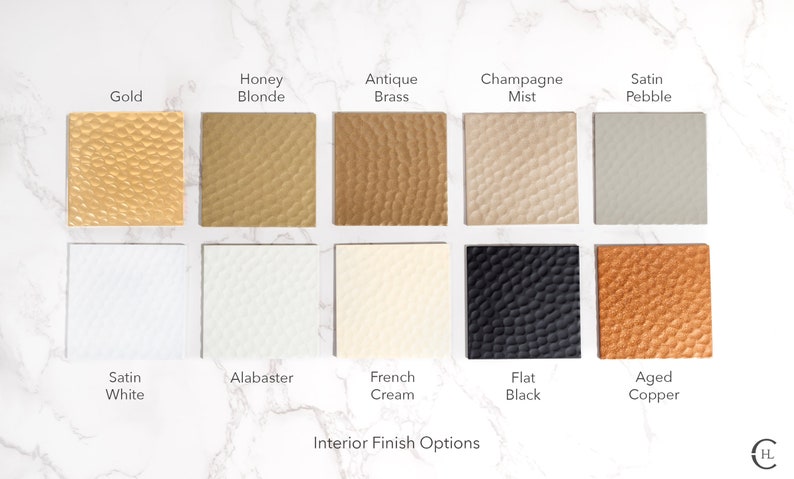 May include: Interior finish options for furniture, shown as swatches of different colors and textures.  The options include Gold, Honey Blonde, Antique Brass, Champagne Mist, Satin Pebble, Satin White, Alabaster, French Cream, Flat Black, and Aged Copper.