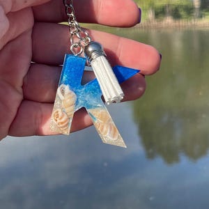 Portachiavi con lettera da spiaggia