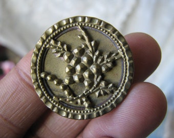 3.5cm. 1 repousse button,antique picture button,trailing rose design with black and white color backing