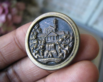 3.5cm. 1 repousse button,antique picture button,trailing rose design with black and white color backing