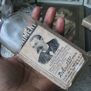 Fles Sloan&#39;s Liniment, fles antiekgeneesmiddel, fles slangenolieverkoper, fles kwakzalver, antieke curiosa, fles voor verzamelaars