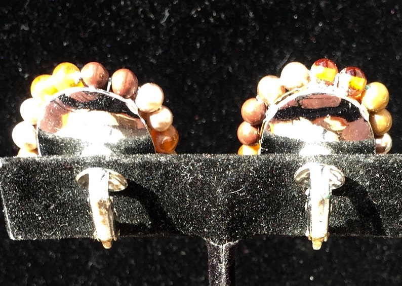 Unsigned Vintage Amber and copper colored beaded clip on earrings Mint condition